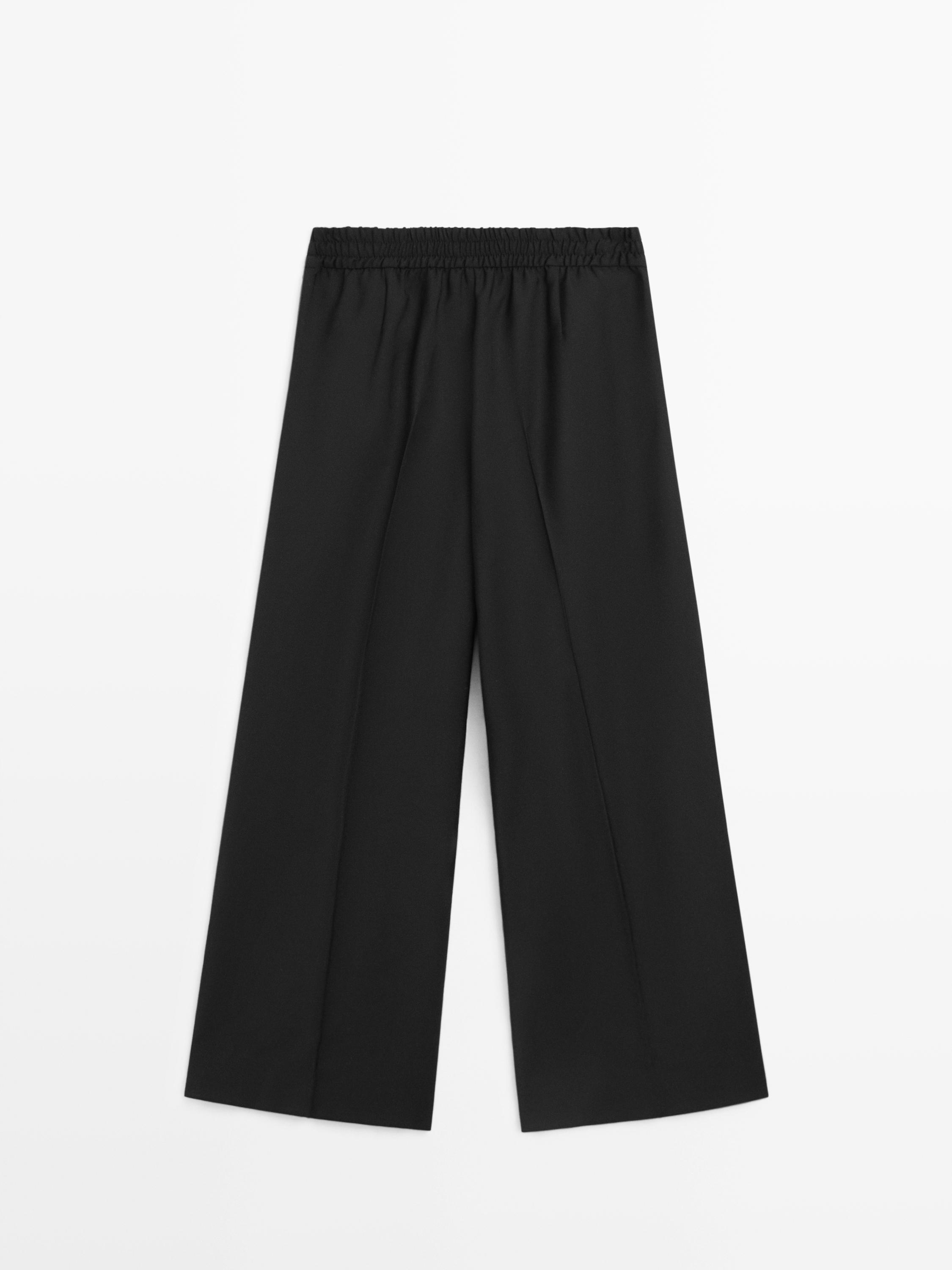 100% wool cropped wide-leg elasticated trousers